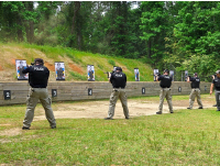 Officers at an outdoor gun range