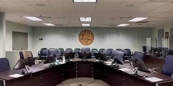 Wide shot of the Parole and Pardon Hearing room.