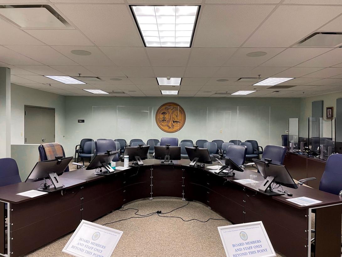 Wide shot of the Parole and Pardon Hearing room.